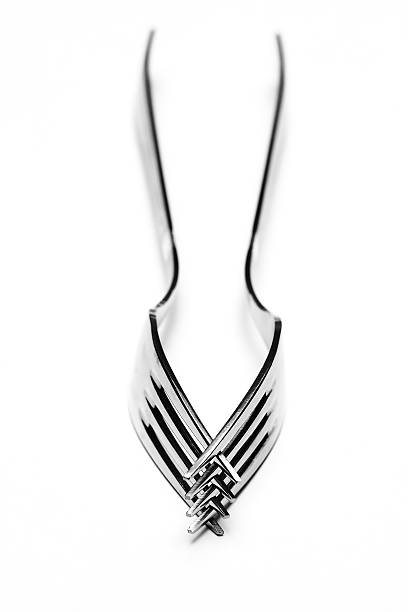 Two forks on white stock photo