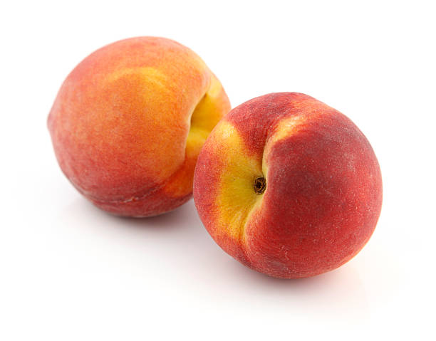 Two Fresh Peaches  peach stock pictures, royalty-free photos & images