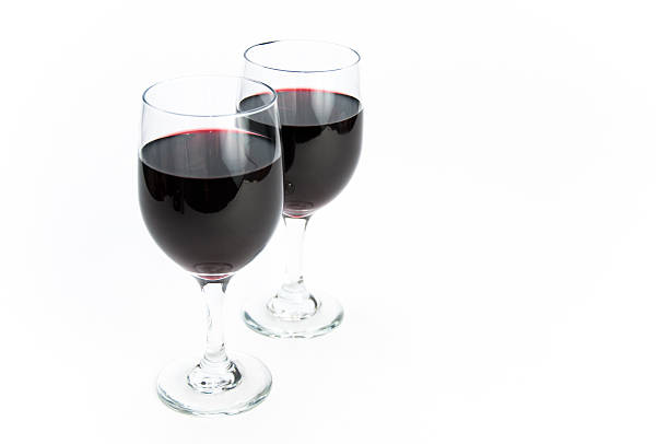 Two glasses of red wine on isolating background stock photo