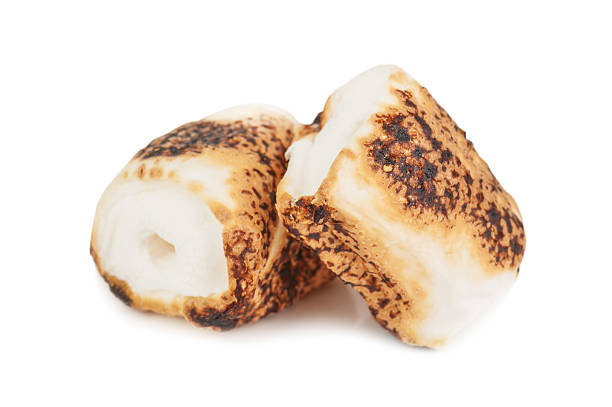 two grilled murshmallow two grilled murshmallow on white background toasted food stock pictures, royalty-free photos & images