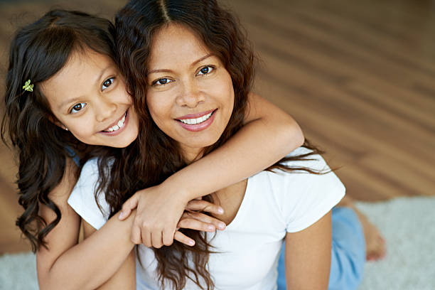 Two happy beauties Portrait of beautiful contemporary Indian mother and daughter asian beauties stock pictures, royalty-free photos & images