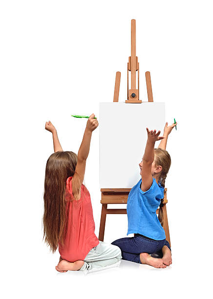 two happy girl painting stock photo