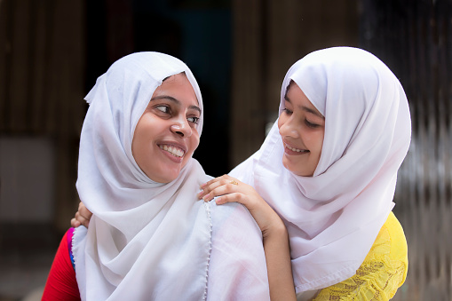 Two Happy Muslim Women With Traditional Veil Stock Photo Two Happy Muslim Women With Traditional Veil Stock Photo