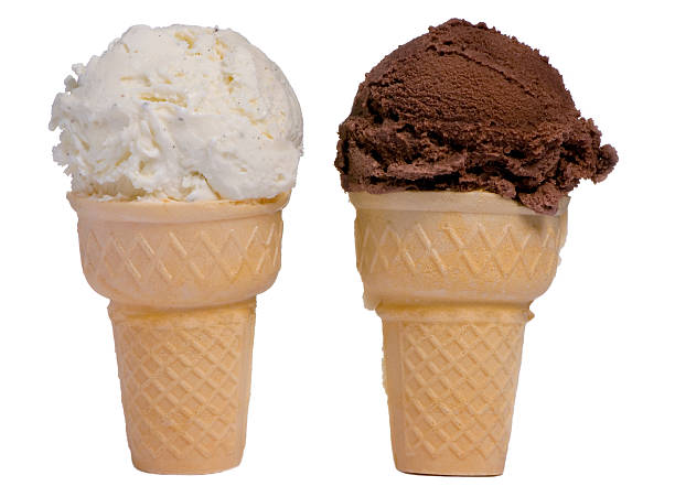 Two ice cream cones, one with vanilla and one with chocolate stock photo