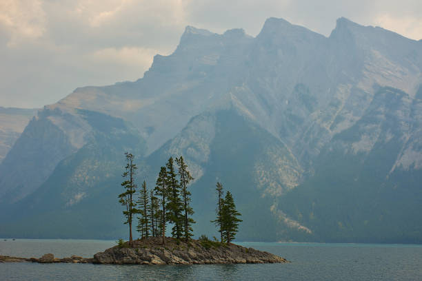 Two Jack Lake, Minnewanka lake. Rocky mountain canada ( Canadian Rockies ). Near the city of Calgary. Portrait, fine art. Banff National Park, Alberta, Canada: August 2, 2018 stock photo