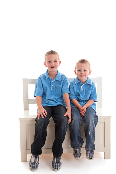Two Little  Boys On a Bench stock photo