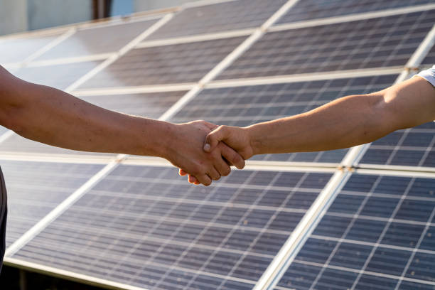 two man handshake after the conclusion of the agreement stock photo