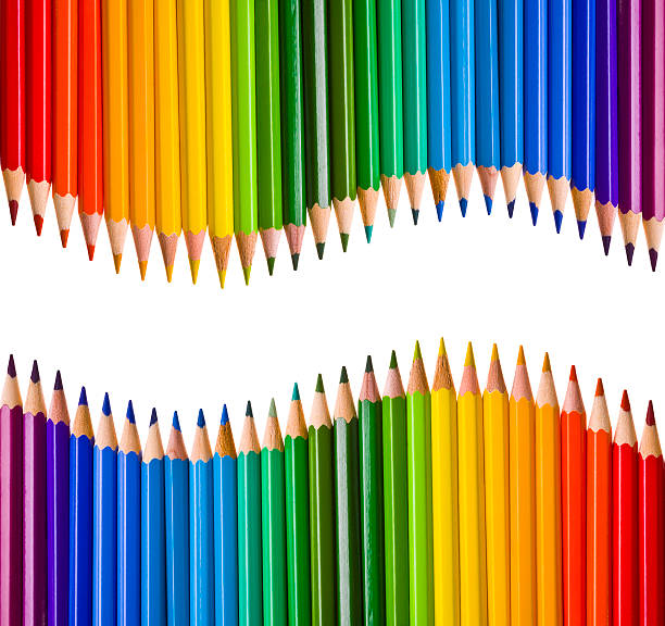 two mirrored waves of colorful pencils - hogeschool rood samen stockfoto's en -beelden