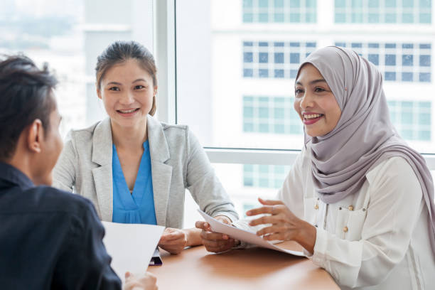 Two officer interviewing a new hire Two officer interviewing a new hire business Malaysia stock pictures, royalty-free photos & images