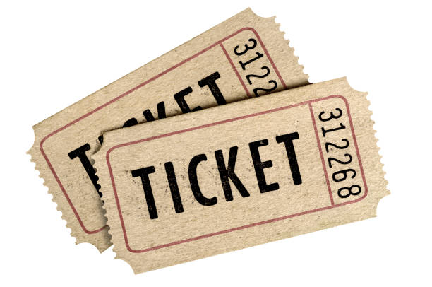 Two old movie ticket stub isolated white background. stock photo