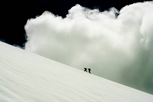 Photo of Two People Climbing Mountain Glacier