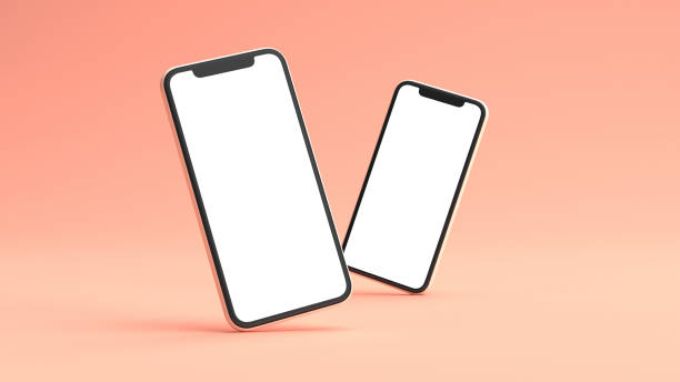 Two phones mockup on a pink background. 3D rendering. Blank screen template stock photo