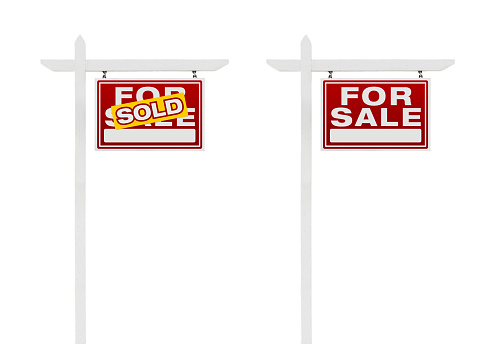 Two Right Facing Sold and For Sale Real Estate Signs With Clipping Paths Isolated on White Background.
