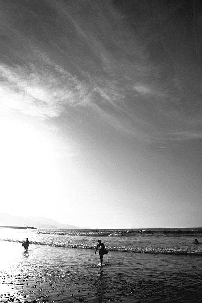 Two Surfers Black and White stock photo