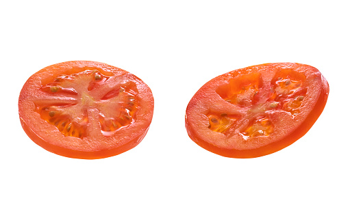 two tomato slices isolated on white background