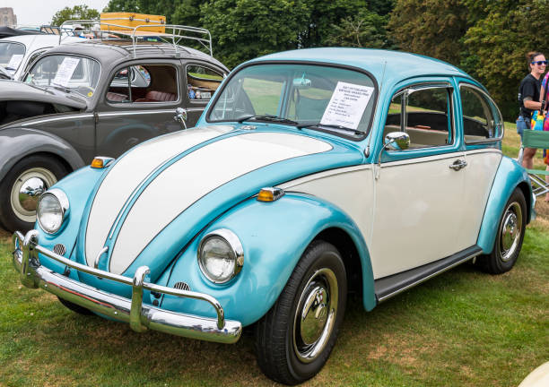 A 1967 VW two toned bug on display at the Pittsburgh Vintage Grand Prix, a yearly event for the past 38 years that holds public car shows leading up to the race in Schenley Park stock photo