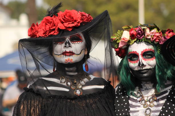 Two women in Calavera Catrina costume stock photo