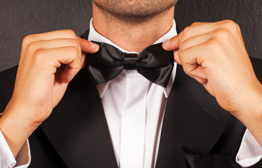 Tying Bow Tie Stock Photo - Download Image Now - iStock