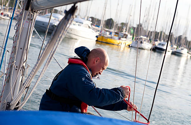 Tying sailing knots stock photo
