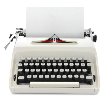 Typewriter with a blank page. Insert your own message. Isolated on white.