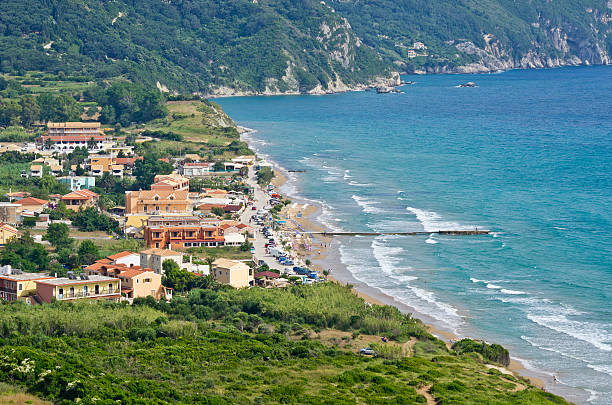 Typical bay with little town Arillas - Corfu, Greece stock photo