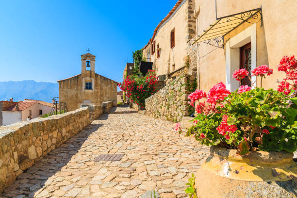 Typical church in small Corsican village of Sant' Antonino, Corsica, France Corsica is the largest French island on Mediterranean Sea and most popular holiday destination for French people. corsica stock pictures, royalty-free photos & images