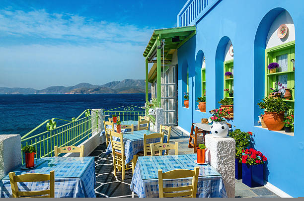 Typical colorful Greek restaurant in Greece stock photo