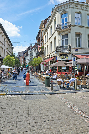 Brussels, Belgium - July 16, 2014:  Brussels city life at lunch time. Square Place Jourdan at Etterbeek near European Commission and EU-district in Brussels. Typical daily lunch time scene in Brussels. At this places are several restaurants and bars.