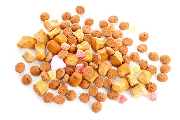 typical dutch sweets: pepernoten (ginger nuts) - pepernoten stockfoto's en -beelden