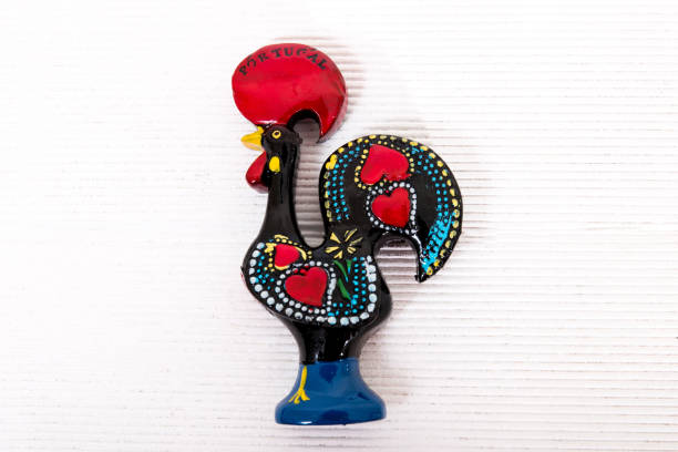 Typical figurine of a Barcelos Rooster Typical figurine of a Barcelos Rooster over a white background. barcelos stock pictures, royalty-free photos & images