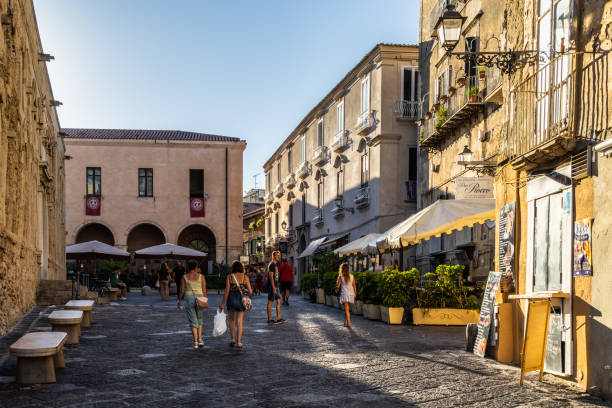 A typical street in Tropea old town at sunset, Calabria, Italy stock photo