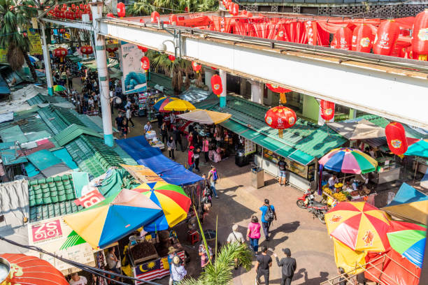 A typical view in Kuala Lumpur in malaysia Kualar Lumpur Malaysia. March 12 2019. A view of the famous Petaling market in Kuala Lumpur in malaysia central market kuala lumpur stock pictures, royalty-free photos & images