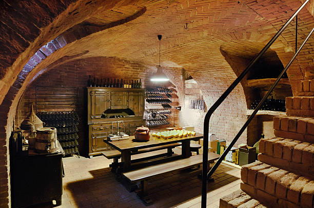 Typical wine cellar of a rustic house, terracotta and wood. stock photo