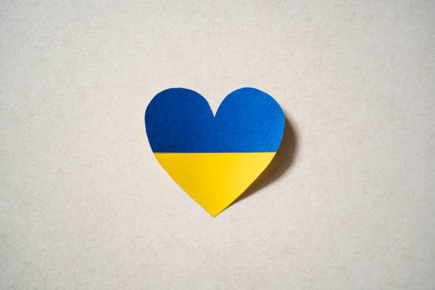 Ukraine flag color heart made of paper stock photo