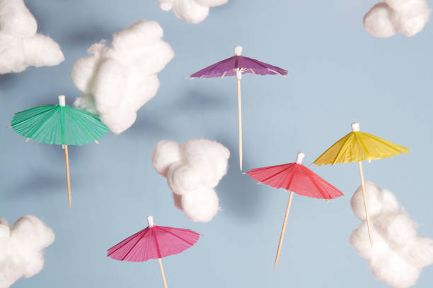 umbrella flying in the air stock photo