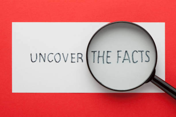 Uncover The Facts Uncover the facts showing through magnifying glass. Business concept. rejection photos stock pictures, royalty-free photos & images