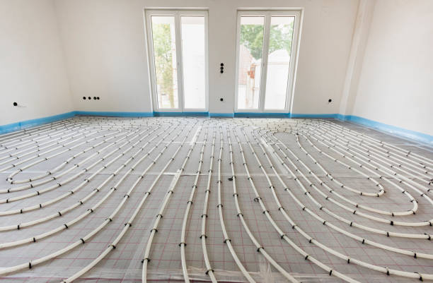underfloor heating in construction of new residential house stock photo