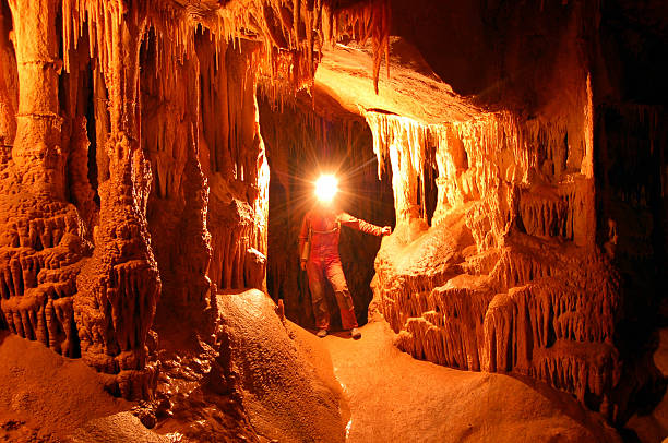 underground-life - höhlenklettern stock-fotos und bilder