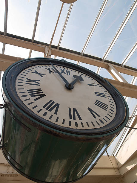 Underneath the railway station clock Carnforth stock photo