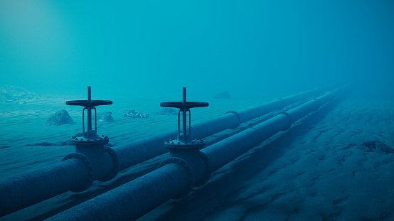 Underwater oil pipelines on ocean floor.