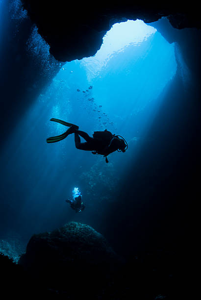 Underwater swimming A scuba diver in Malta deep stock pictures, royalty-free photos & images