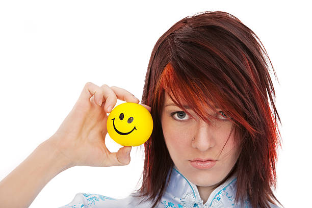 Unhappy and happy faces stock photo