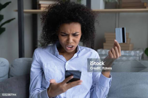 Unhappy biracial woman confused with bank error paying online