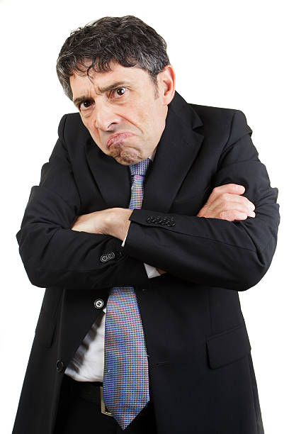 Royalty Free Angry Frowning Grumpy Middle Age Man With Arms Folded