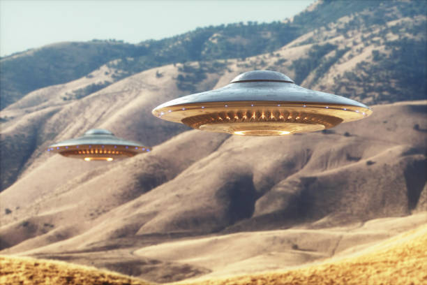 Unidentified Flying Object UFO Two unidentified flying objects - UFO, flying over the sunny desert. ufo stock pictures, royalty-free photos & images