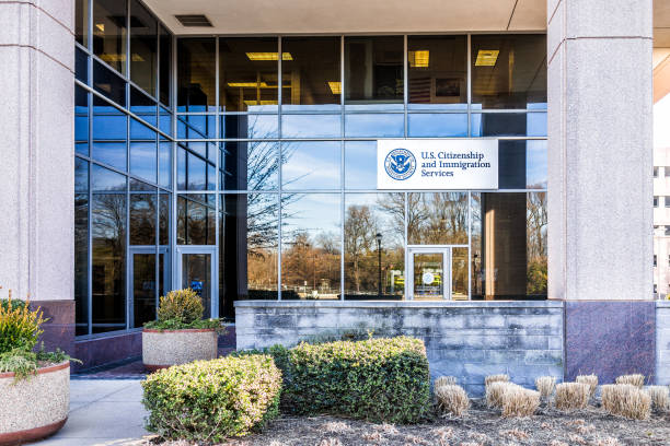USCIS US United States Citizenship and Immigration Services field main office entrance in Virginia with sign stock photo
