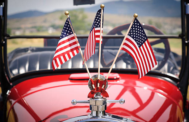 United States Flags on an Old Car stock photo