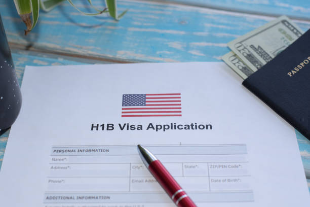 United States of America H1B visa application Illustrative picture showing application for USA H1B visa passport stamp stock pictures, royalty-free photos & images