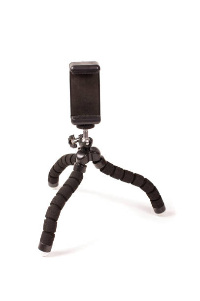 Universal smart phone tripod isolated on the white stock photo