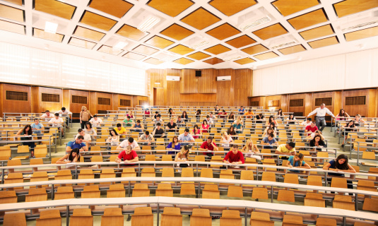 University Amphitheatre Full Of Students Doing Exam Stock Photo - Download  Image Now - iStock